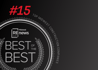A graphic with “#15” in red and “Best of the Best” in white inside a laurel wreath, with “Top Midwest Construction Companies” and the Midwest REnews logo on a dark background.