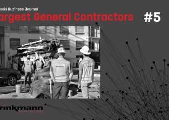 Two construction workers wearing hard hats and safety vests stand at a job site with a truck and building in the background. Text on the image highlights Largest General Contractors #5.